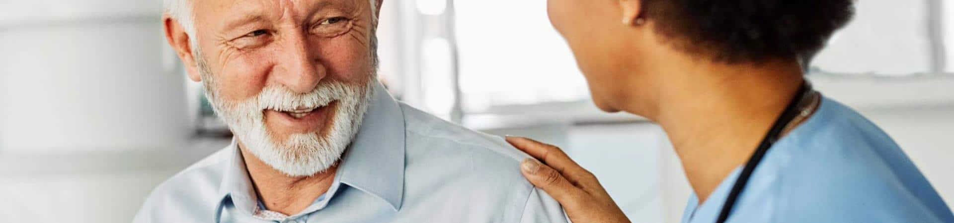Man Smiling At Nurse