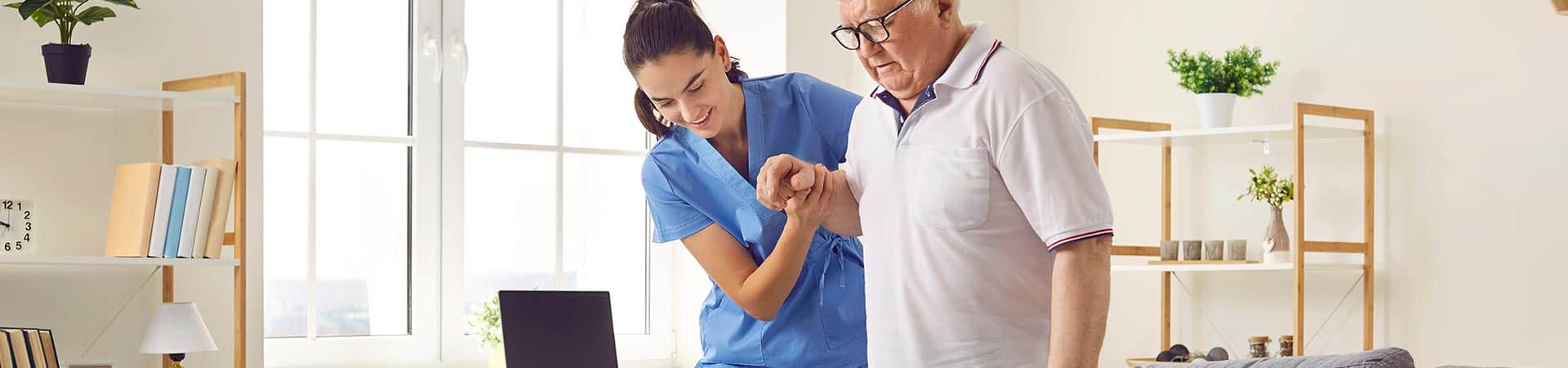 Nurse Helping Man Walk