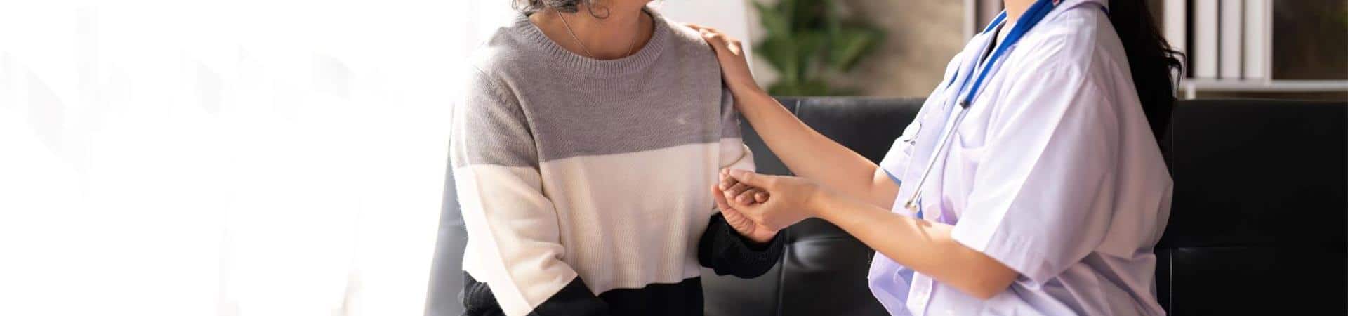 Nurse Senior Holding Hands